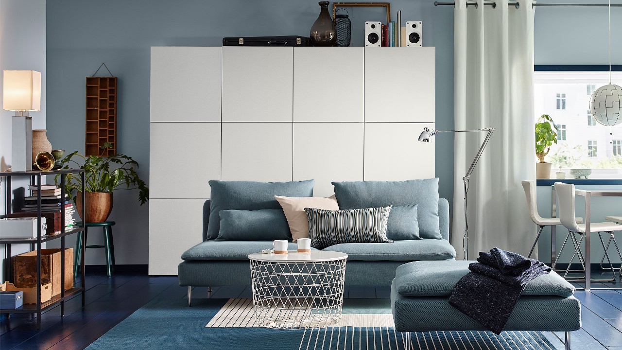 A cabinet, a bed, a tea table, and a sofa; image used for IKEA promotion page.