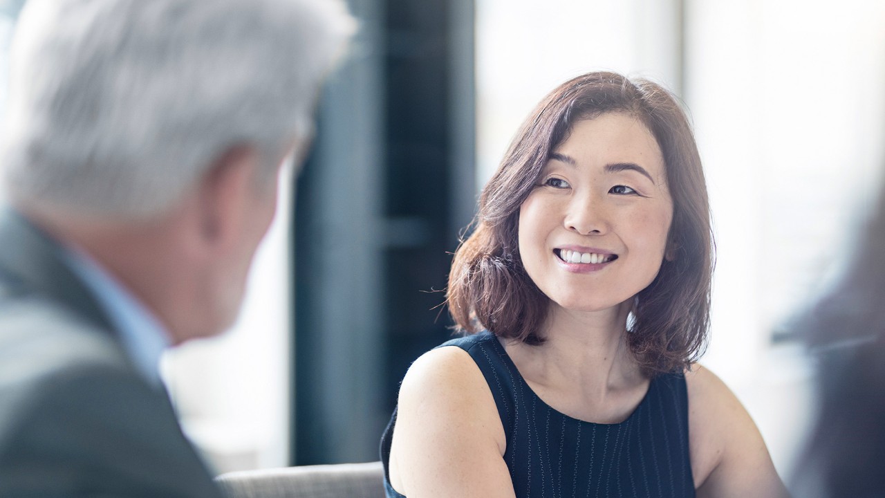 A woman is smiling at a man; image used for HSBC Malaysia Bonds