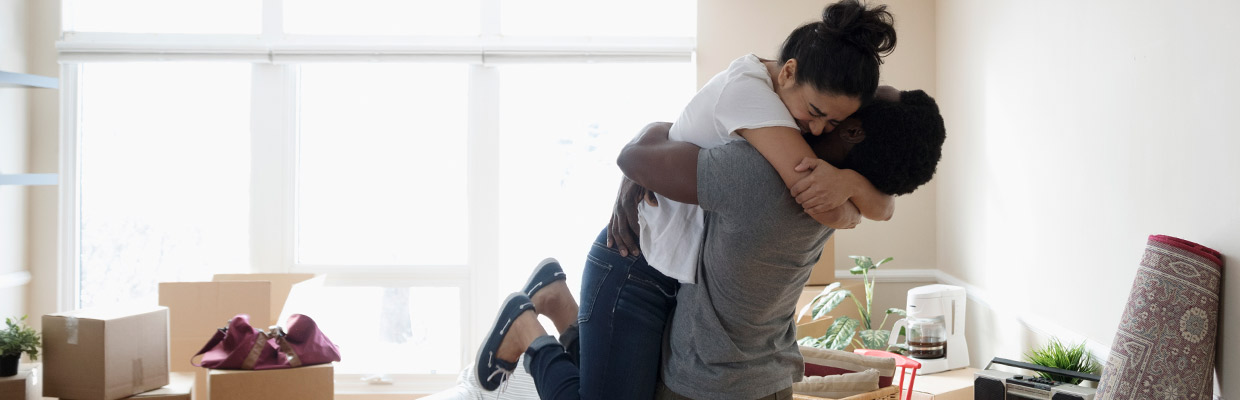 A man and woman hugging; image used for HSBC Malaysia First Home Mortgage